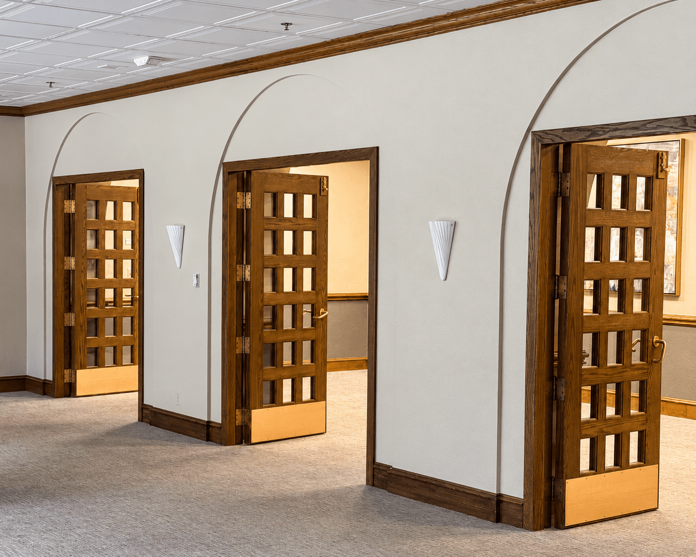 Restored brass door hardware in a high-end hotel entrance