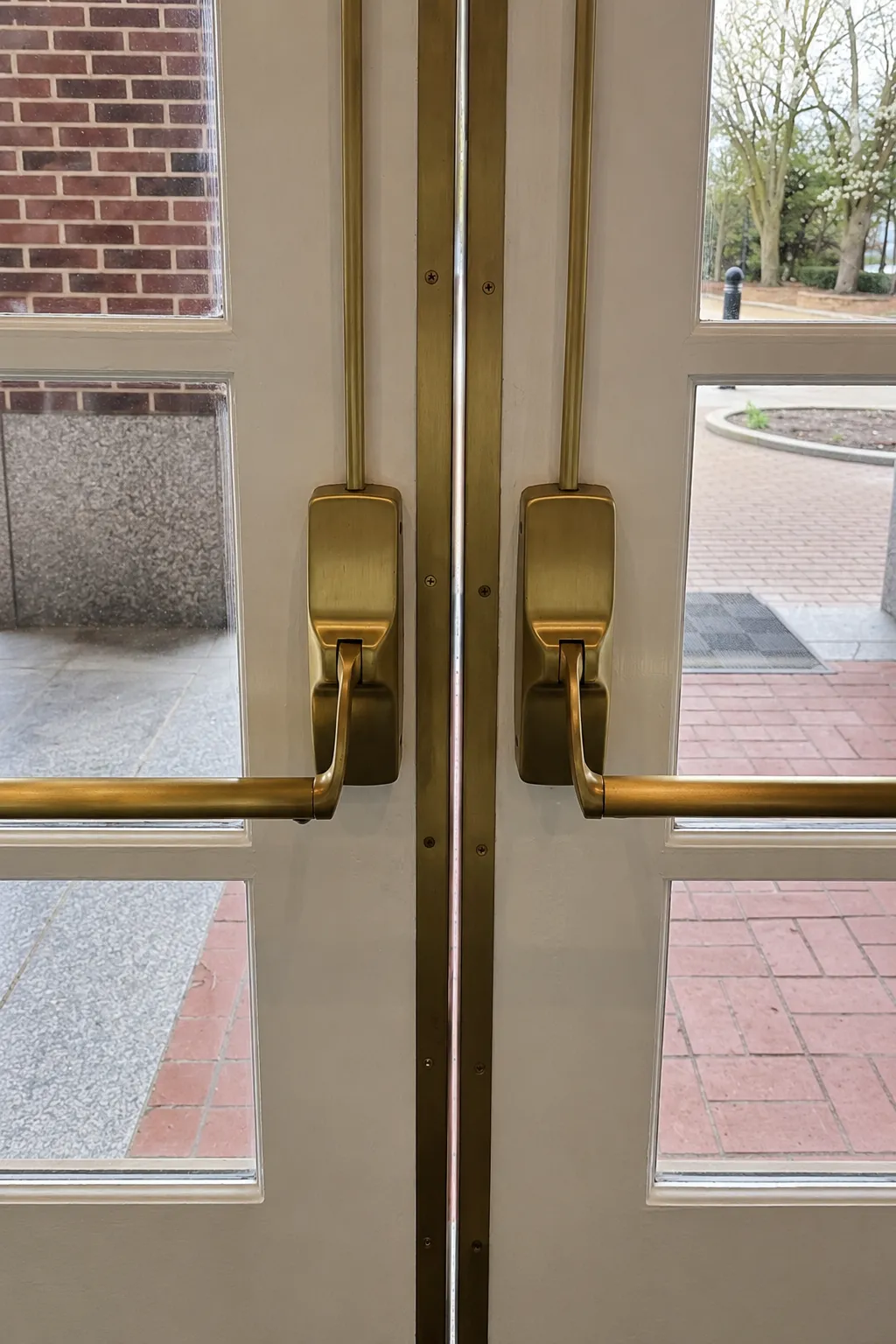 Polished brass door hardware after refinishing